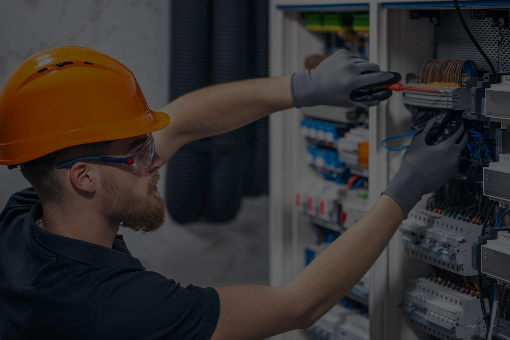 male-electrician-working-switchboard-with-fuses_169016-53685